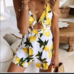 Lemon tie front romper. Sipper back. M
